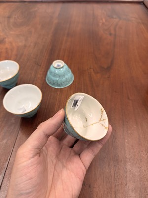 Lot 51 - Four Chinese turquoise-enamelled ogee wine cups, Qing dynasty, Qianlong marks and period