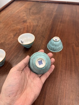Lot 51 - Four Chinese turquoise-enamelled ogee wine cups, Qing dynasty, Qianlong marks and period