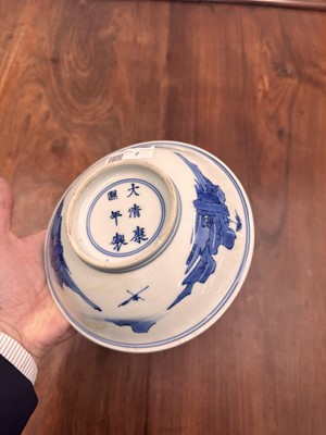 Lot 7 - A fine Chinese blue and white 'Sea house Addition' shallow bowl, Qing dynasty, Kangxi mark and of the period
