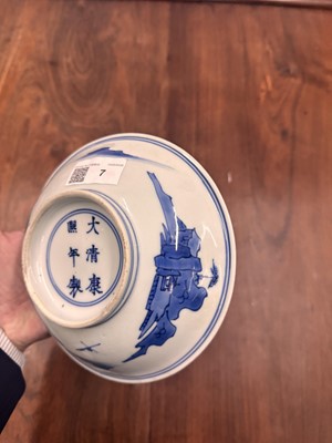 Lot 7 - A fine Chinese blue and white 'Sea house Addition' shallow bowl, Qing dynasty, Kangxi mark and of the period