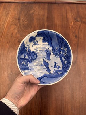 Lot 7 - A fine Chinese blue and white 'Sea house Addition' shallow bowl, Qing dynasty, Kangxi mark and of the period