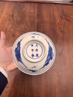 Lot 7 - A fine Chinese blue and white 'Sea house Addition' shallow bowl, Qing dynasty, Kangxi mark and of the period