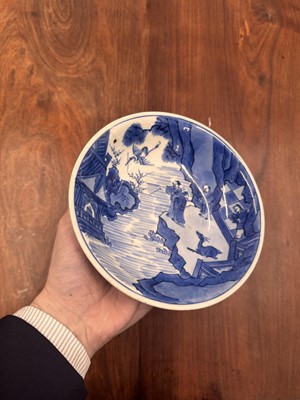 Lot 7 - A fine Chinese blue and white 'Sea house Addition' shallow bowl, Qing dynasty, Kangxi mark and of the period