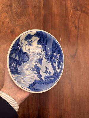 Lot 7 - A fine Chinese blue and white 'Sea house Addition' shallow bowl, Qing dynasty, Kangxi mark and of the period