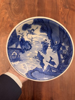 Lot 7 - A fine Chinese blue and white 'Sea house Addition' shallow bowl, Qing dynasty, Kangxi mark and of the period