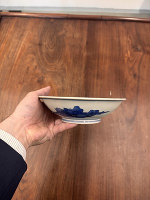 Lot 7 - A fine Chinese blue and white 'Sea house Addition' shallow bowl, Qing dynasty, Kangxi mark and of the period