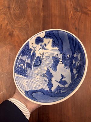 Lot 7 - A fine Chinese blue and white 'Sea house Addition' shallow bowl, Qing dynasty, Kangxi mark and of the period