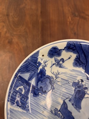 Lot 7 - A fine Chinese blue and white 'Sea house Addition' shallow bowl, Qing dynasty, Kangxi mark and of the period