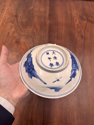Lot 7 - A fine Chinese blue and white 'Sea house Addition' shallow bowl, Qing dynasty, Kangxi mark and of the period