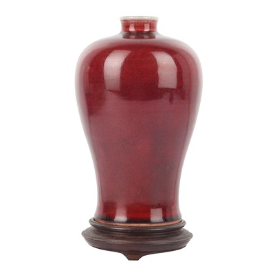 Lot 81 - A Chinese copper red-glazed vase, meiping, Qing dynasty, 18th/19th century