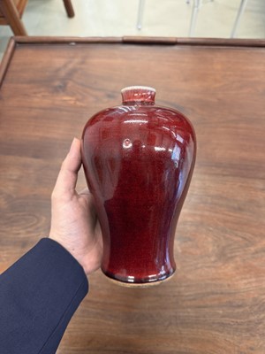 Lot 81 - A Chinese copper red-glazed vase, meiping, Qing dynasty, 18th/19th century