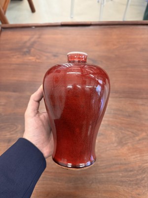 Lot 81 - A Chinese copper red-glazed vase, meiping, Qing dynasty, 18th/19th century