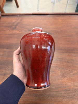 Lot 81 - A Chinese copper red-glazed vase, meiping, Qing dynasty, 18th/19th century
