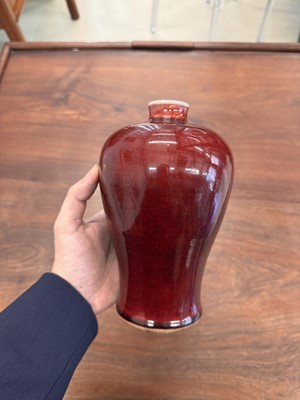 Lot 81 - A Chinese copper red-glazed vase, meiping, Qing dynasty, 18th/19th century