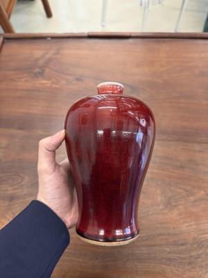 Lot 81 - A Chinese copper red-glazed vase, meiping, Qing dynasty, 18th/19th century