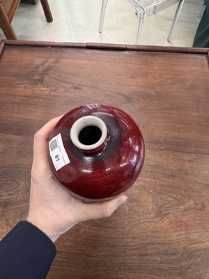 Lot 81 - A Chinese copper red-glazed vase, meiping, Qing dynasty, 18th/19th century
