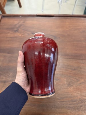 Lot 81 - A Chinese copper red-glazed vase, meiping, Qing dynasty, 18th/19th century