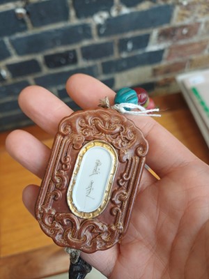 Lot 70 - A Chinese abstinence plaque, Qing dynasty, 19th century