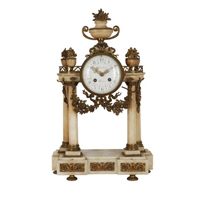 Lot 47 - A 19th century French gilt metal mounted onyx portico clock