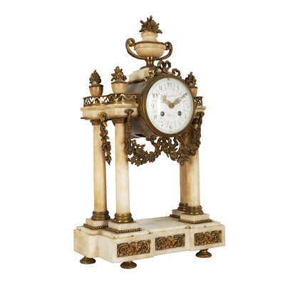 Lot 47 - A 19th century French gilt metal mounted onyx portico clock