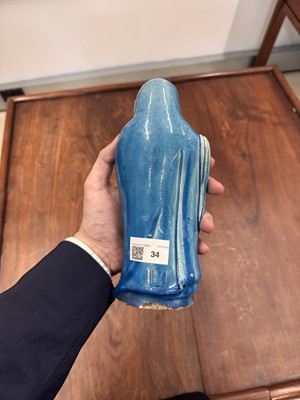 Lot 34 - A Chinese monochrome turquoise-glazed figure of Daruma, Qing dynasty, Kangxi period