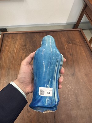 Lot 34 - A Chinese monochrome turquoise-glazed figure of Daruma, Qing dynasty, Kangxi period