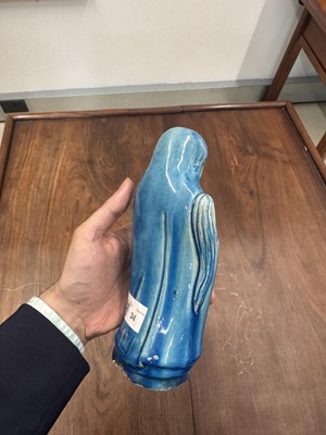 Lot 34 - A Chinese monochrome turquoise-glazed figure of Daruma, Qing dynasty, Kangxi period
