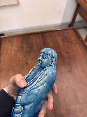 Lot 34 - A Chinese monochrome turquoise-glazed figure of Daruma, Qing dynasty, Kangxi period