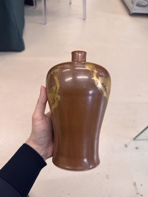 Lot 83 - A Chinese gilt-decorated cafe au lait-glazed 'fish' vase, Qing dynasty, 18th century