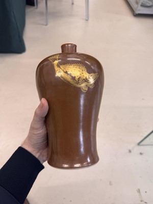 Lot 83 - A Chinese gilt-decorated cafe au lait-glazed 'fish' vase, Qing dynasty, 18th century
