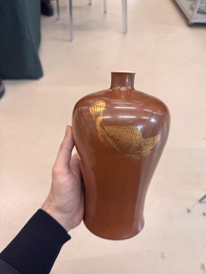 Lot 83 - A Chinese gilt-decorated cafe au lait-glazed 'fish' vase, Qing dynasty, 18th century