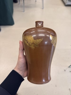 Lot 83 - A Chinese gilt-decorated cafe au lait-glazed 'fish' vase, Qing dynasty, 18th century