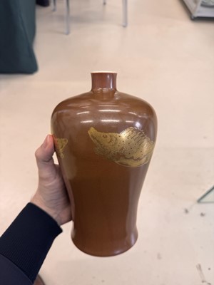 Lot 83 - A Chinese gilt-decorated cafe au lait-glazed 'fish' vase, Qing dynasty, 18th century