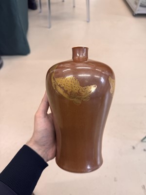 Lot 83 - A Chinese gilt-decorated cafe au lait-glazed 'fish' vase, Qing dynasty, 18th century