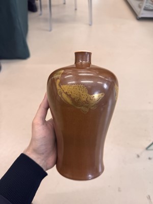 Lot 83 - A Chinese gilt-decorated cafe au lait-glazed 'fish' vase, Qing dynasty, 18th century
