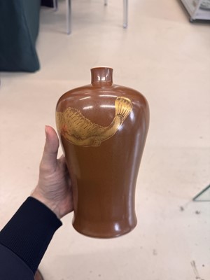 Lot 83 - A Chinese gilt-decorated cafe au lait-glazed 'fish' vase, Qing dynasty, 18th century