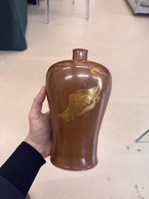 Lot 83 - A Chinese gilt-decorated cafe au lait-glazed 'fish' vase, Qing dynasty, 18th century