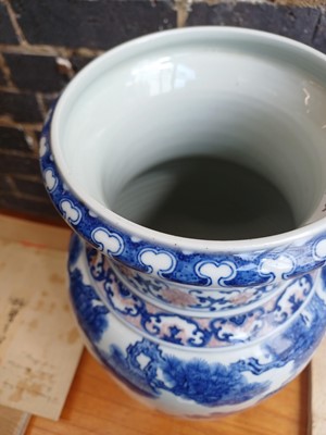 Lot 94 - A large Chinese underglaze-copper-red and blue lantern vase, Qing dynasty, 19th century
