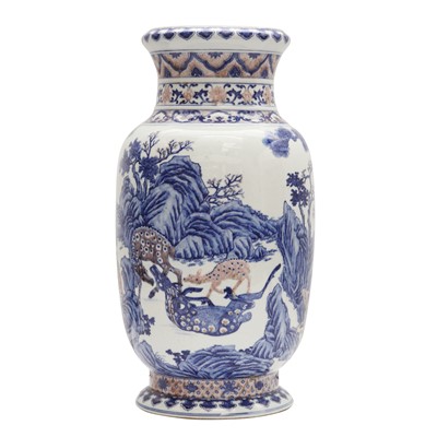 Lot 94 - A large Chinese underglaze-copper-red and blue lantern vase, Qing dynasty, 19th century