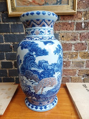 Lot 94 - A large Chinese underglaze-copper-red and blue lantern vase, Qing dynasty, 19th century