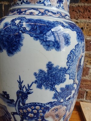 Lot 94 - A large Chinese underglaze-copper-red and blue lantern vase, Qing dynasty, 19th century