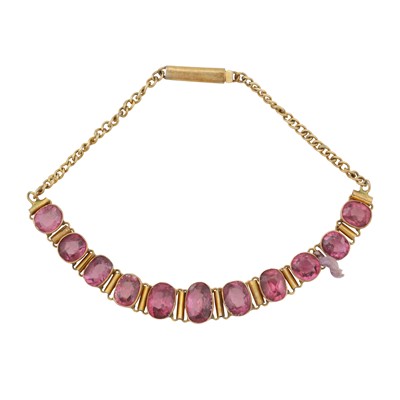 Lot 242 - A garnet line bracelet