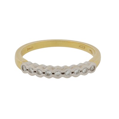 Lot 451 - A diamond half eternity ring