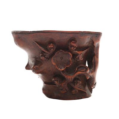 Lot 212 - A Chinese huanghuali ‘prunus’ libation cup, 17th/18th century