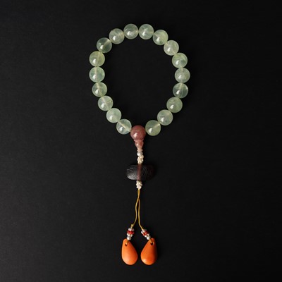 Lot 132 - λ A Chinese hardstone rosary bracelet, Qing dynasty, 19th century