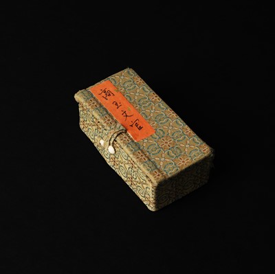 Lot 537 - A Chinese archaistic jade figure of a scholar, 18th/19th century or earlier