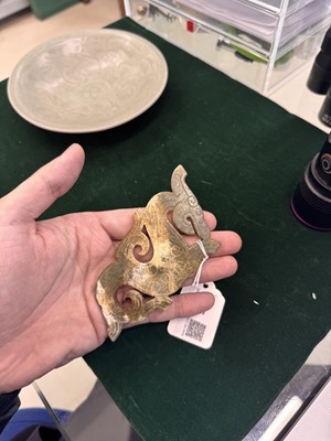 Lot 540 - A Chinese archaistic jade 'dragon' plaque, 18th/19th century or earlier