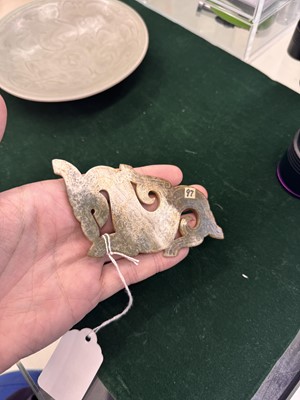 Lot 540 - A Chinese archaistic jade 'dragon' plaque, 18th/19th century or earlier