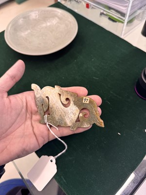 Lot 540 - A Chinese archaistic jade 'dragon' plaque, 18th/19th century or earlier