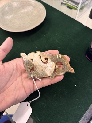 Lot 540 - A Chinese archaistic jade 'dragon' plaque, 18th/19th century or earlier